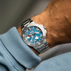 שעון יד יוקרתי של חברת אוריס מסדרת שעוני Oris Aquis Date Upcycle Calibre 400 החדשה.