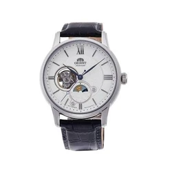RA-AS0011S Orient Classic Sun & Moon הוא שעון אלגנטי מכני אוטומטי הכולל מנגנון גלוי (Open Heart), מחוון יום/לילה ייחודי וזכוכית ספיר